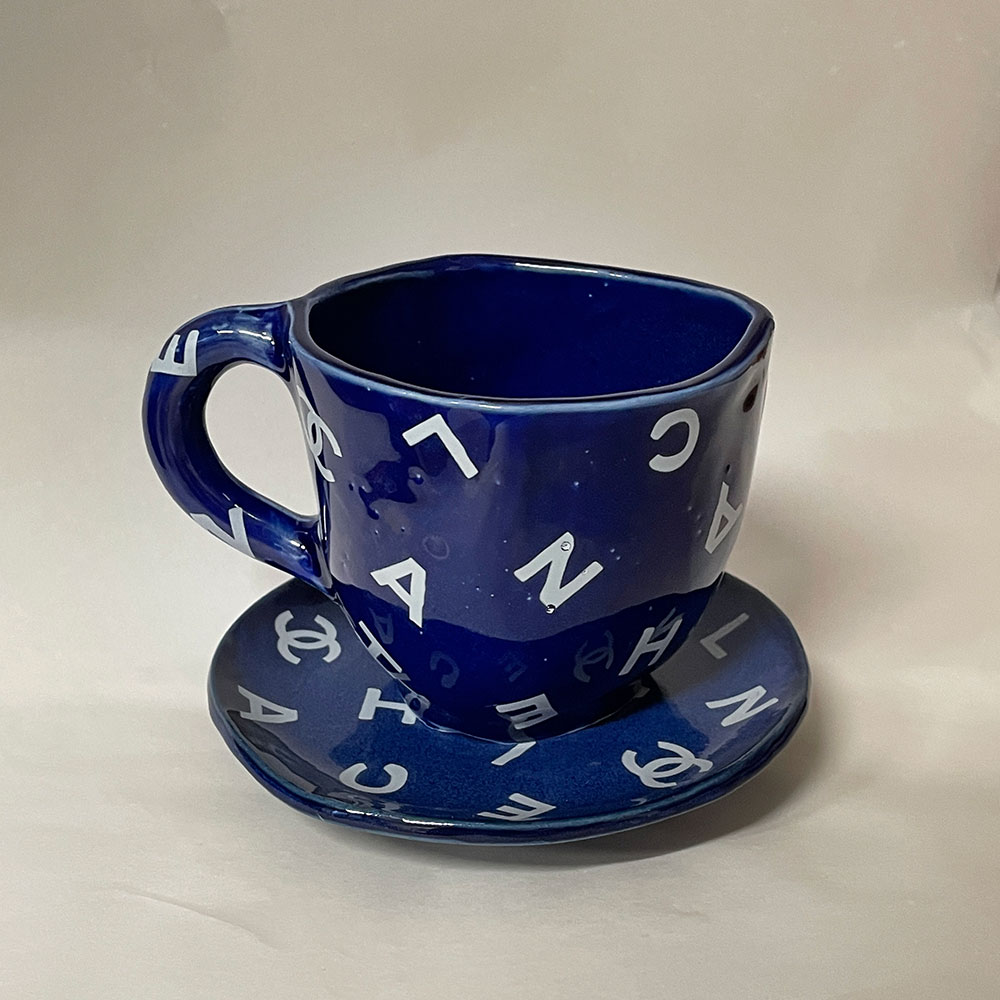 C cup and saucer blue by Rapiditas studio